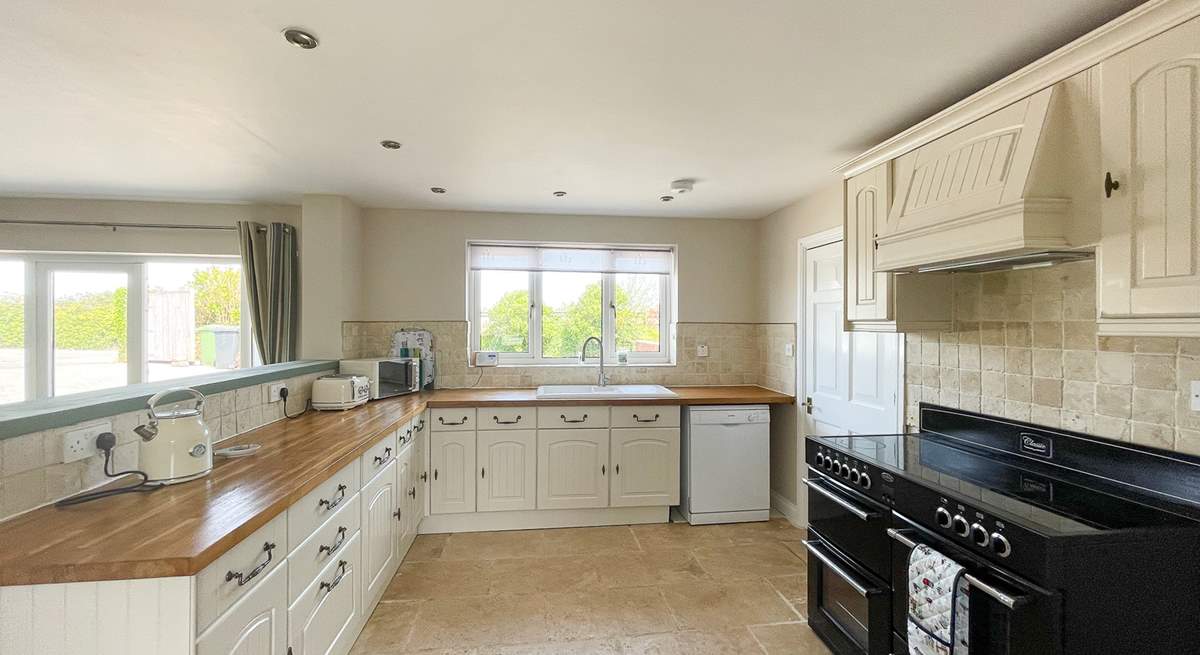 Oodles of space and an impressive four oven range in the kitchen/breakfast-room.
