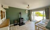 The kitchen/diner also has a wood-burner to keep the chill off at cooler times of year.  - Thumbnail Image