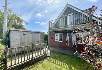 The garden is enclosed, ideal for dogs and children alike. 