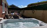 Relax in the hot tub.  - Thumbnail Image