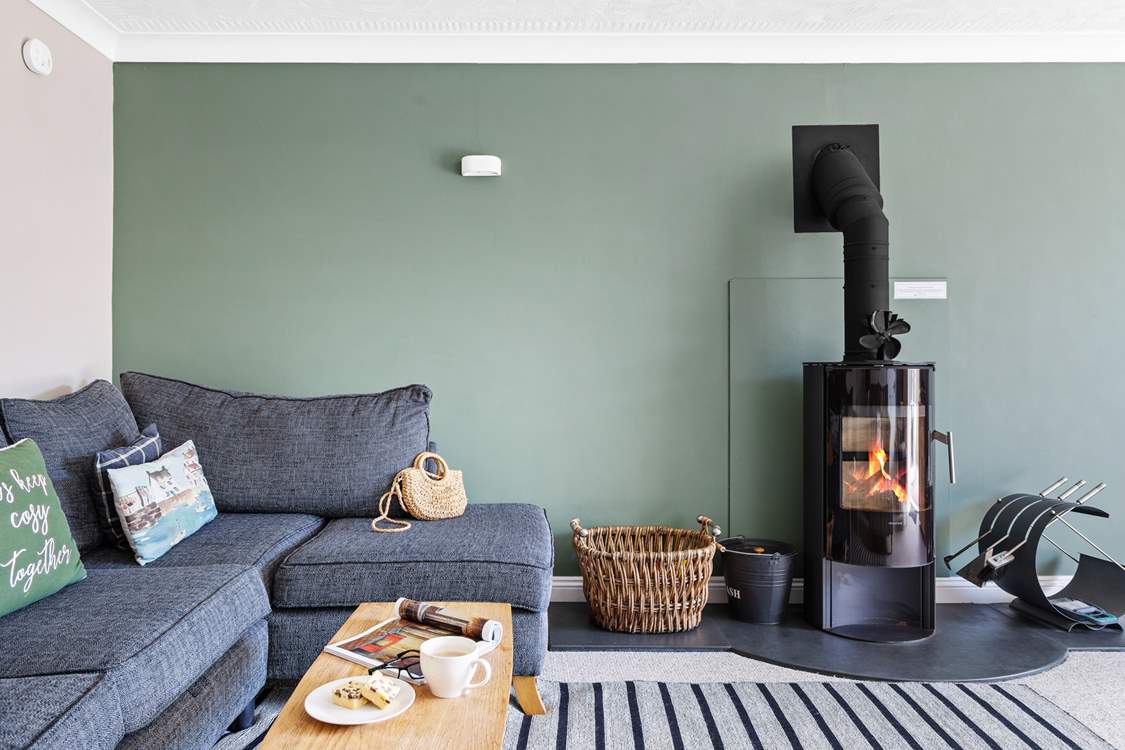 Relax on the cosy corner sofa after a busy beach day.