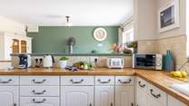 Oodles of space and an impressive four oven range in the kitchen/breakfast-room.