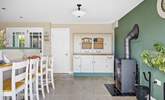 The kitchen/diner also has a wood-burner to keep the chill off at cooler times of year.  - Thumbnail Image
