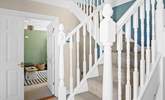 Climb the stairs to the bedrooms on the first floor.  - Thumbnail Image