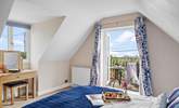 The double bedroom has a balcony, perfect for your morning coffee with a view.  - Thumbnail Image