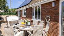 Enjoy the Devonshire sunshine on the secluded patio at The Lodge.