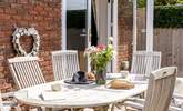 Enjoy the patio from dawn until dusk.  - Thumbnail Image