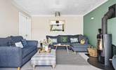The warming wood-burner makes this holiday home ideal throughout the seasons.  - Thumbnail Image