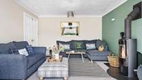 The warming wood-burner makes this holiday home ideal throughout the seasons. 