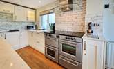 The kitchen is perfect for cooking up a feast. - Thumbnail Image