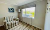 A sweet reading area looking out to the garden. - Thumbnail Image