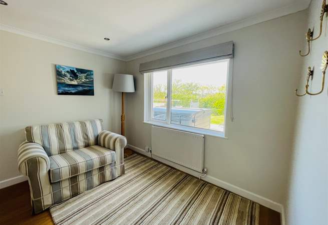 A sweet reading area looking out to the garden.