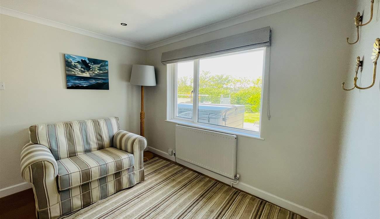 A sweet reading area looking out to the garden.
