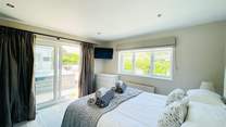 The ground floor king room has an en suite and leads out to the garden.