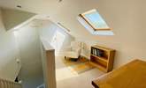 Upstairs you'll find another reading area. - Thumbnail Image
