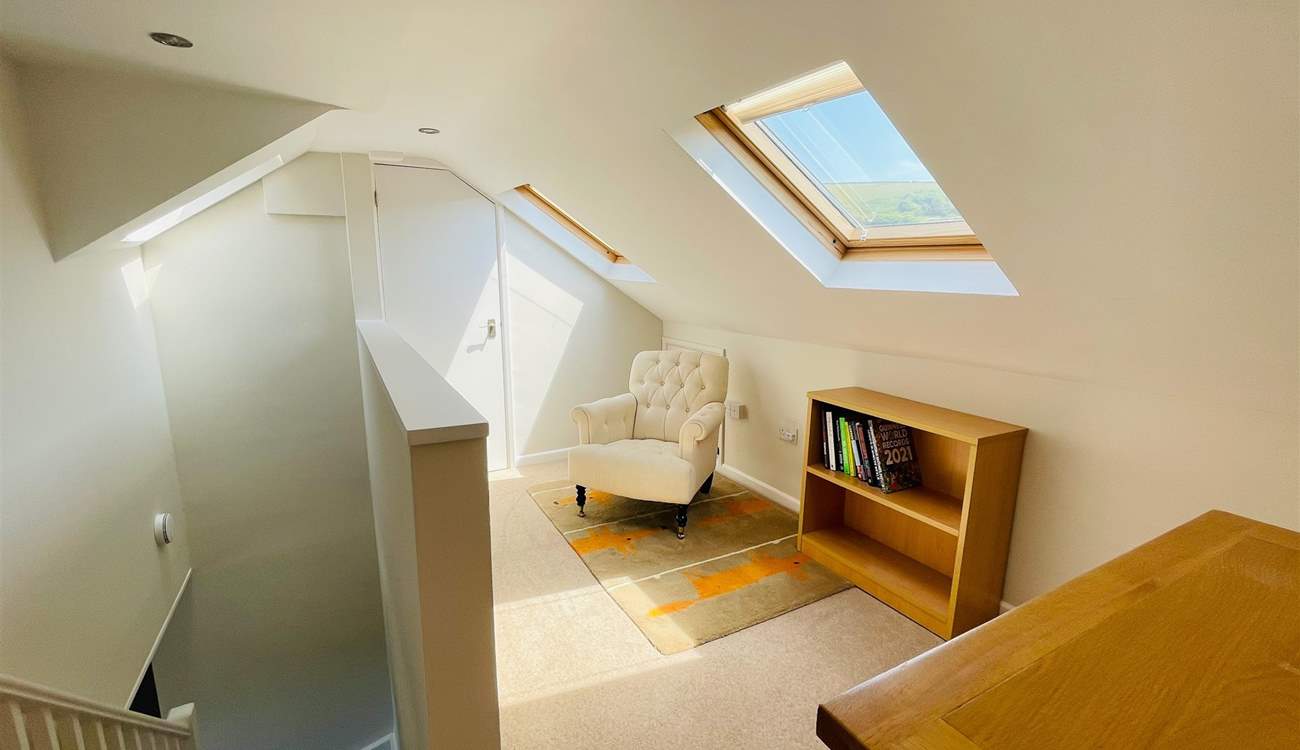 Upstairs you'll find another reading area.