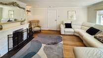 Unwind after a day by the sea in the spacious living-room.