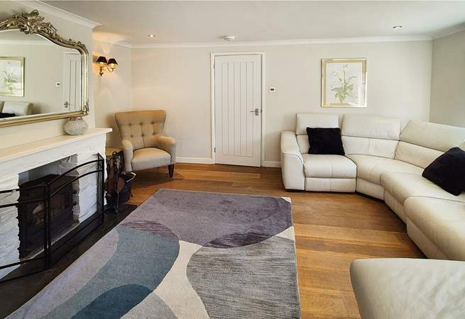 Unwind after a day by the sea in the spacious living-room.