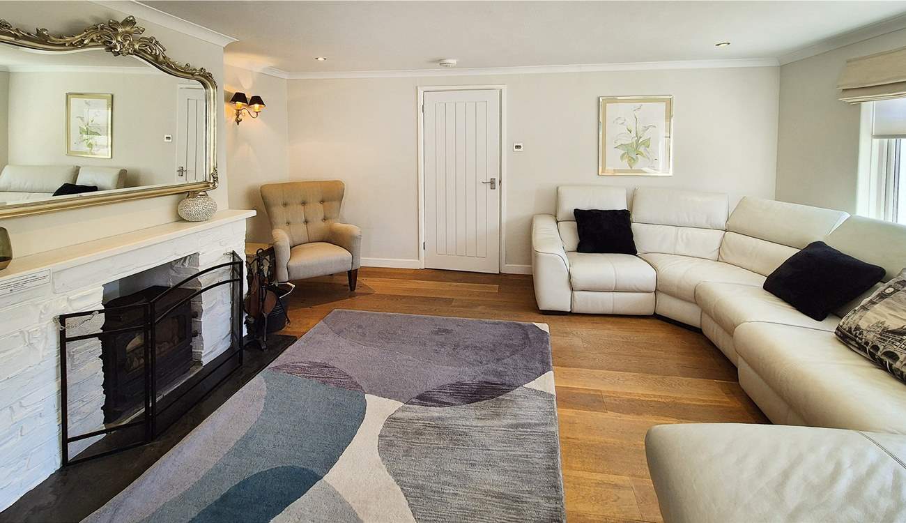 Unwind after a day by the sea in the spacious living-room.