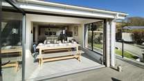 Fold back the bi-fold doors and let the fresh air in. 