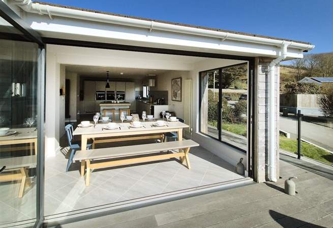 Fold back the bi-fold doors and let the fresh air in. 