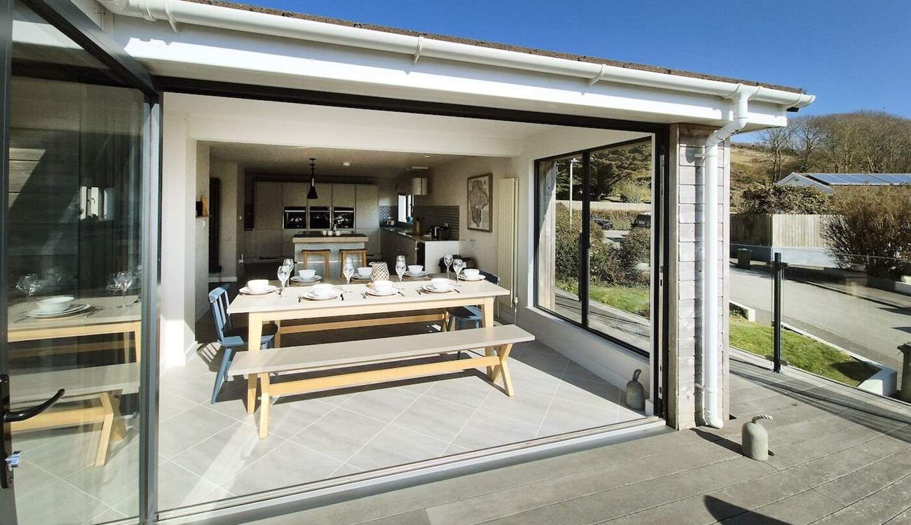 Fold back the bi-fold doors and let the fresh air in. 