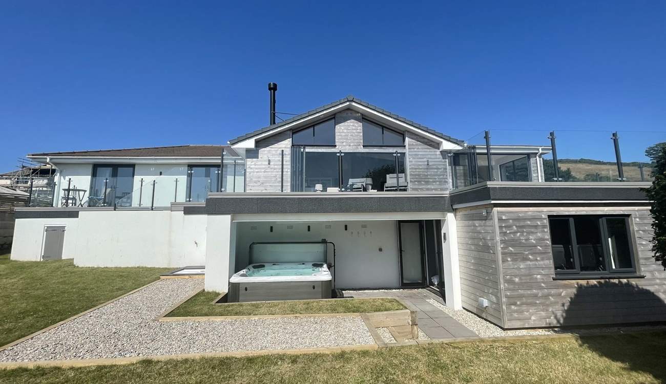 Relax in the hot tub after a busy beach day.