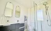 The family bathroom on the first floor has a free-standing bath and separate shower cubicle.  - Thumbnail Image