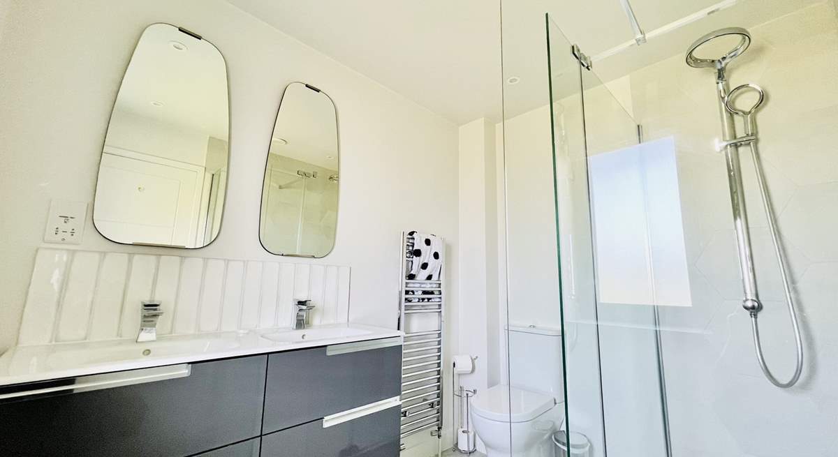 The family bathroom on the first floor has a free-standing bath and separate shower cubicle. 