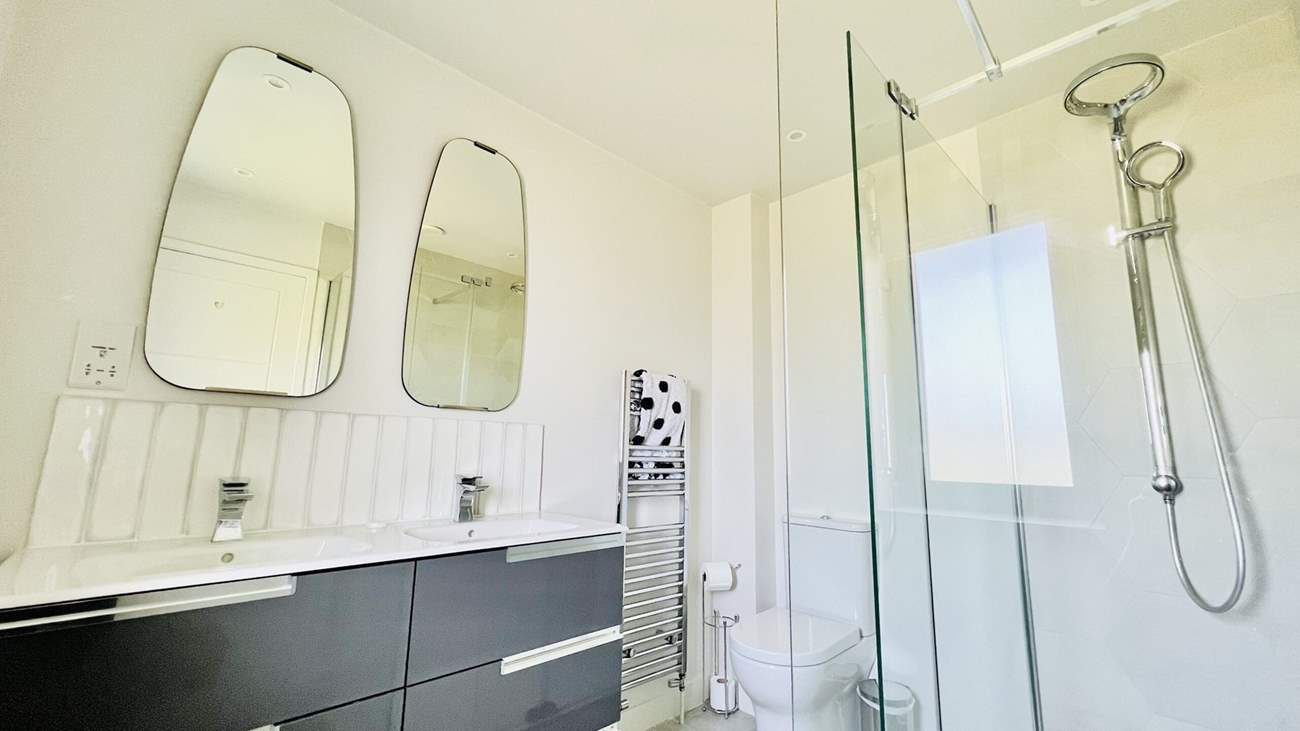The family bathroom on the first floor has a free-standing bath and separate shower cubicle.