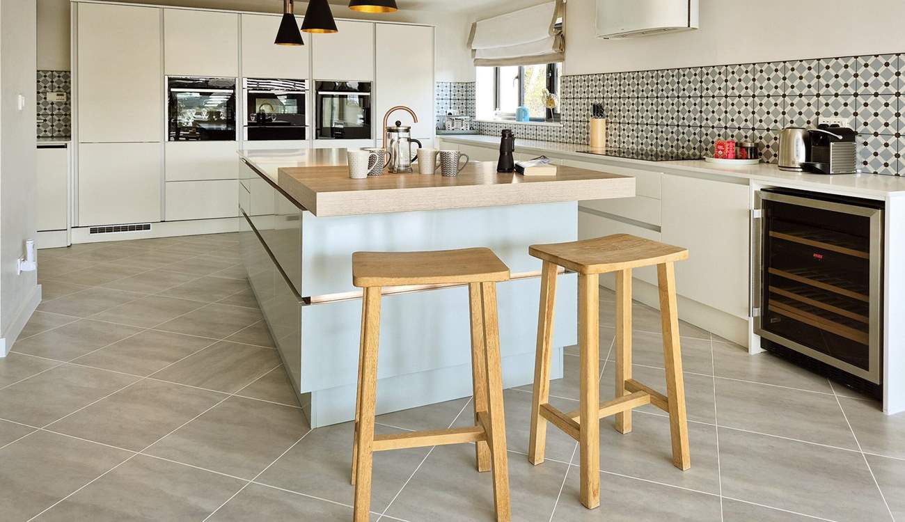 Perch on a stool as dinner is prepared. 