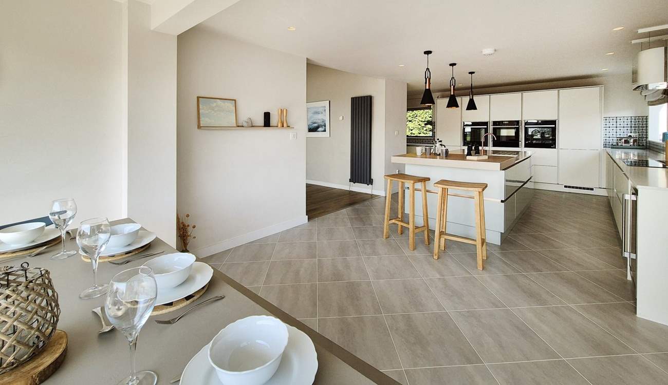 This contemporary space is fabulous for sociable dining on holiday. 