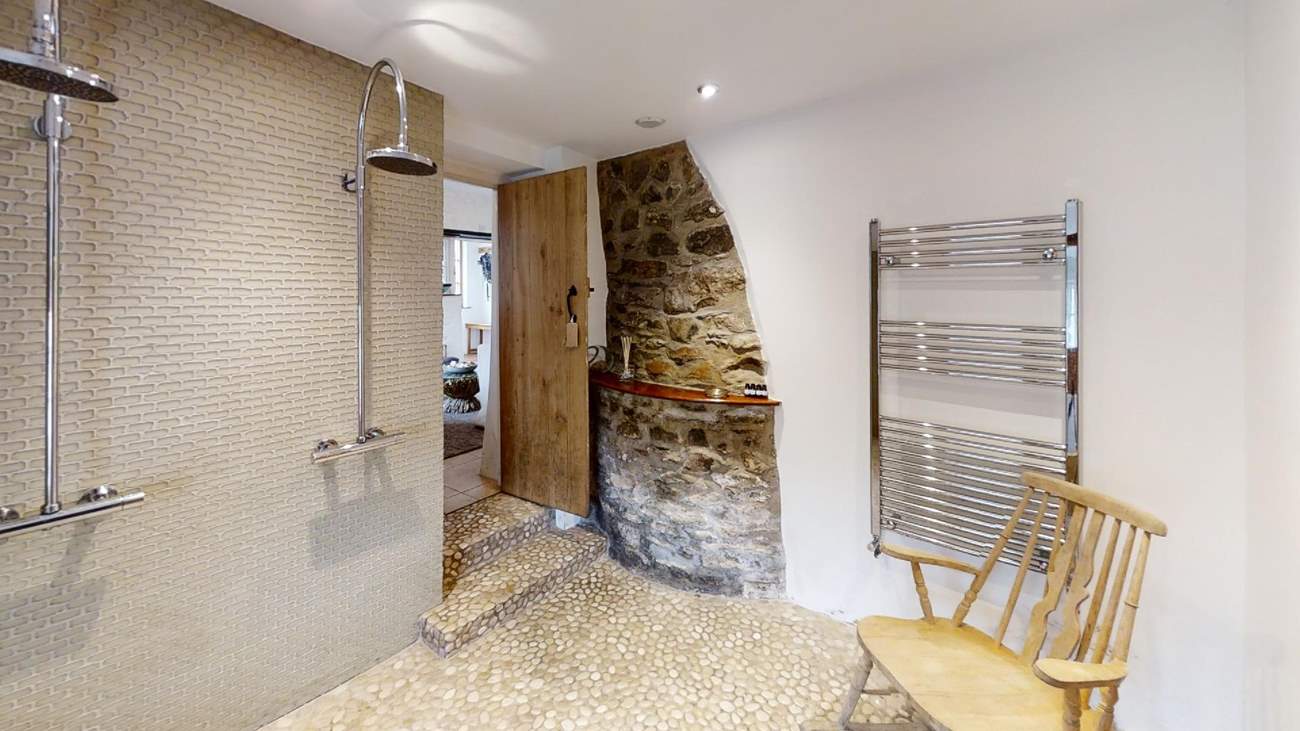 This handy wet room leads to the hot rock sauna.