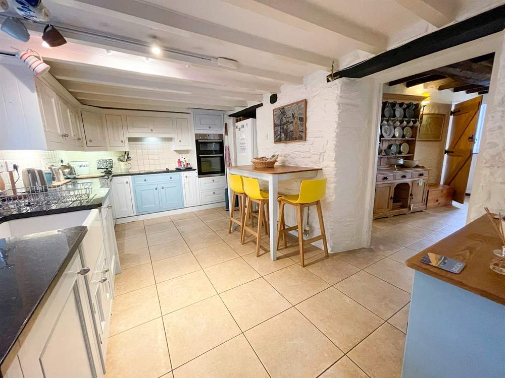 The kitchen has a handy breakfast bar.