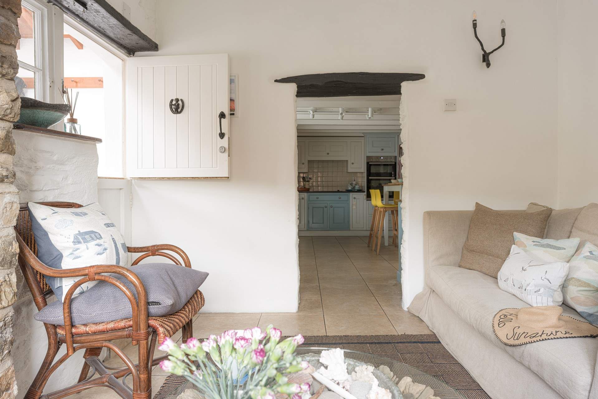 Head back to the kitchen to discover the snug the perfect hangout spot.