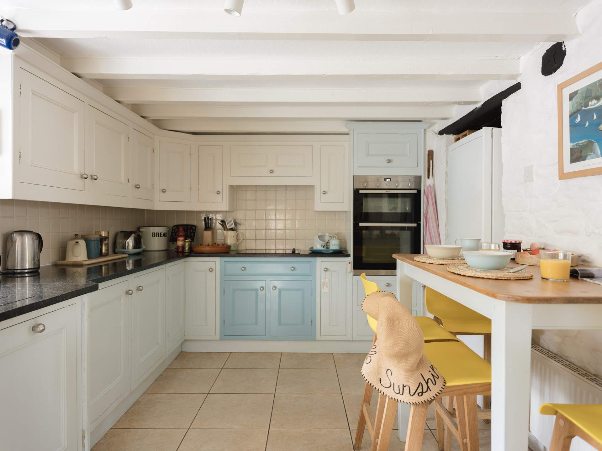 The kitchen is both large and the heart of the home.
