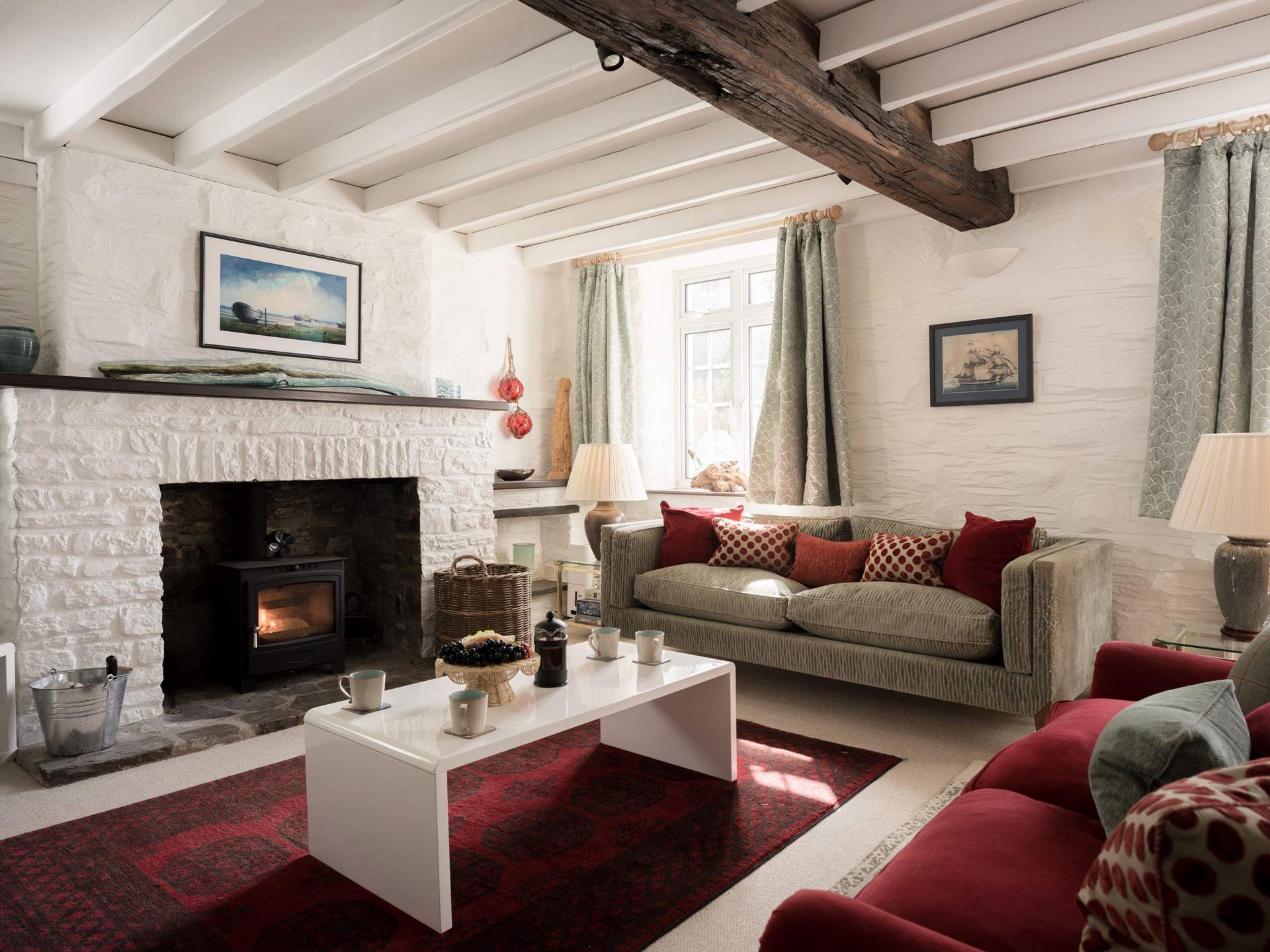The sitting room looks out to the front of the house and enclosed garden.
