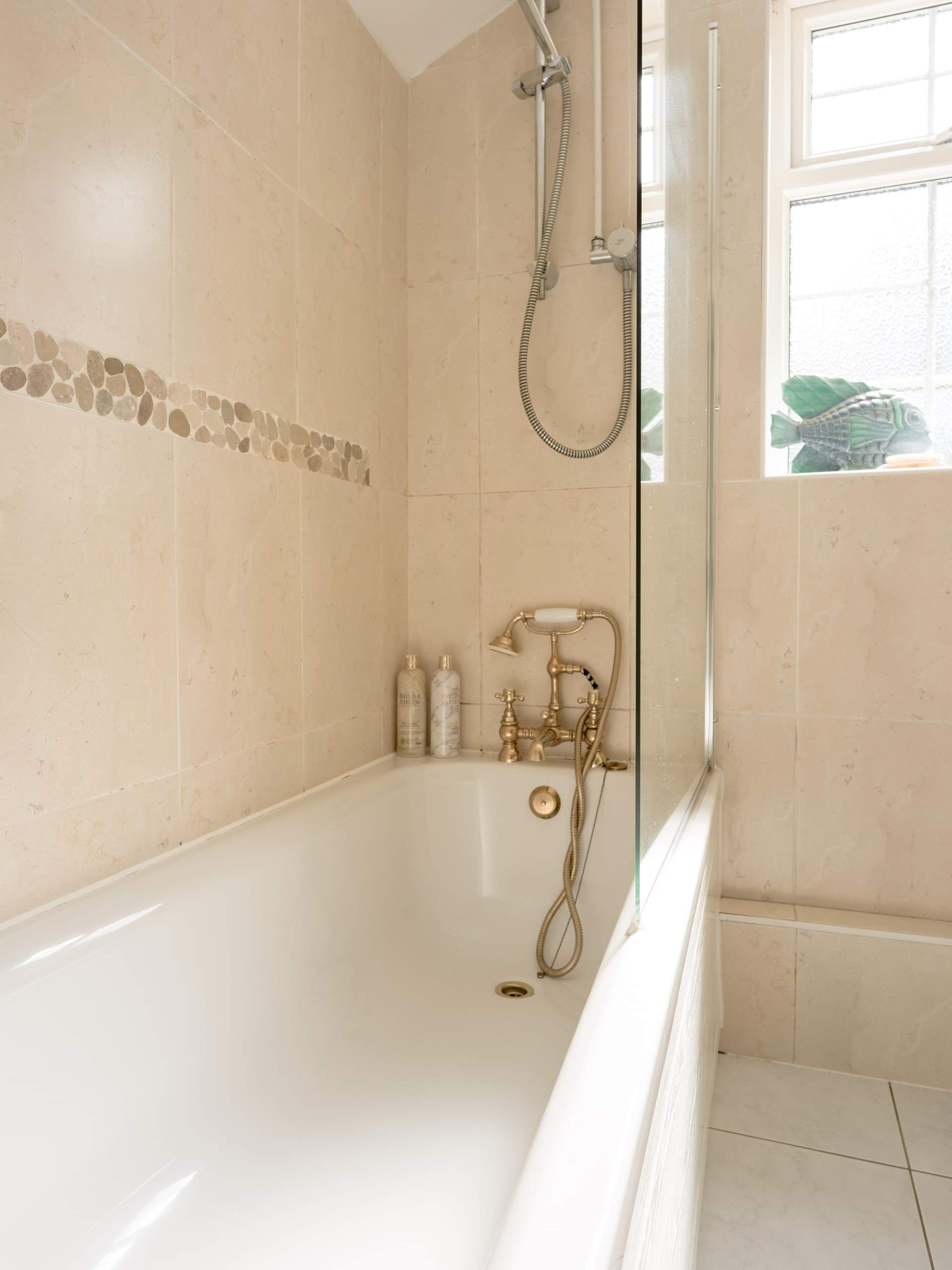 The family bathroom can be found at the end of the landing.