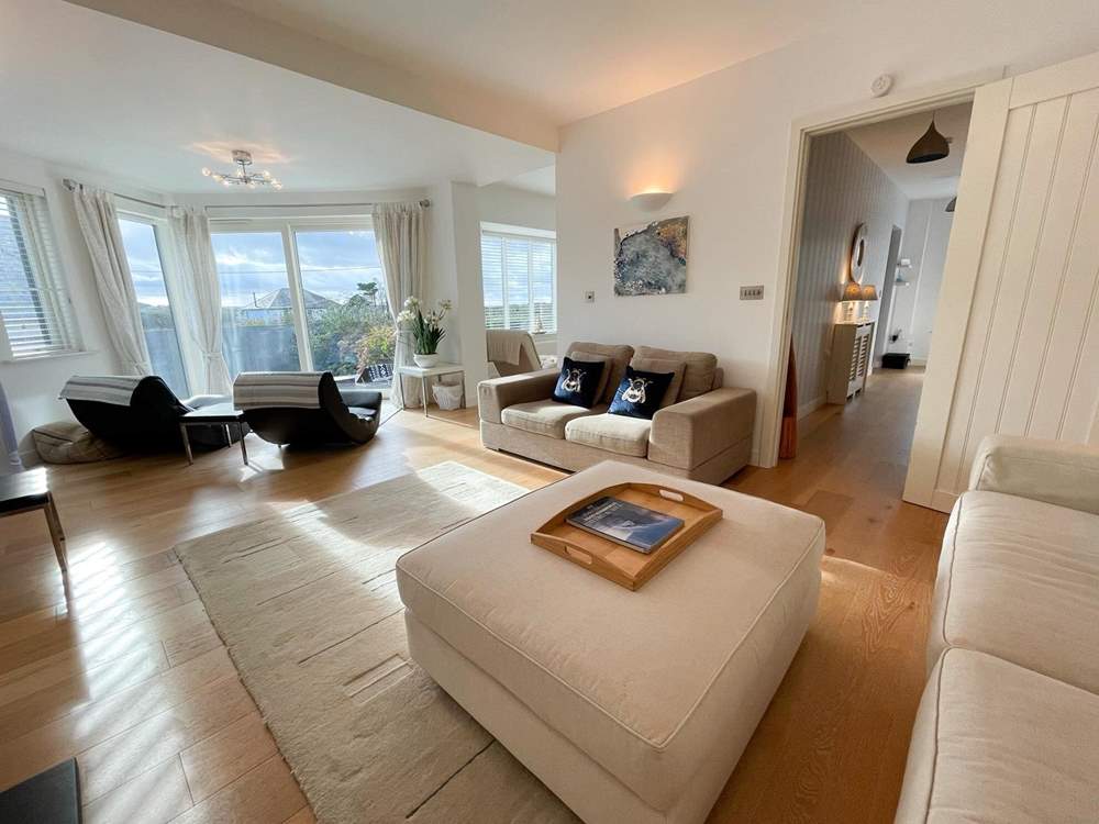 Relax on the sofas and watch a movie on the Smart TV.