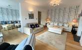 The gorgeous sitting-room has oodles of space for everyone.  - Thumbnail Image