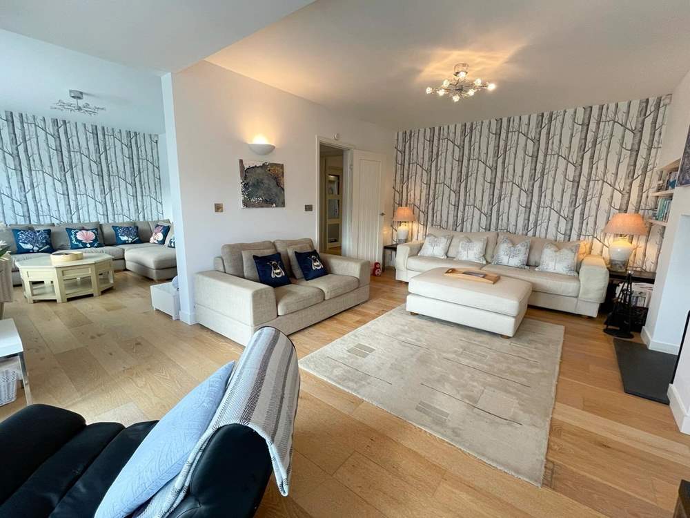 The gorgeous sitting-room has oodles of space for everyone.
