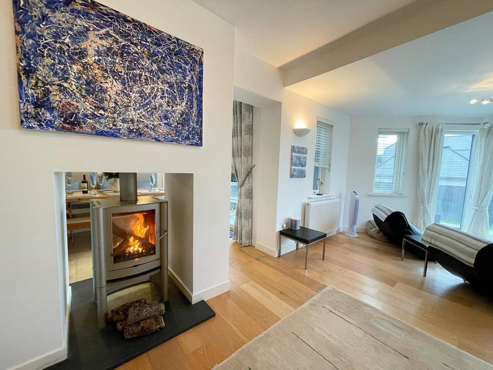 The fire warms both the sitting and dining areas.