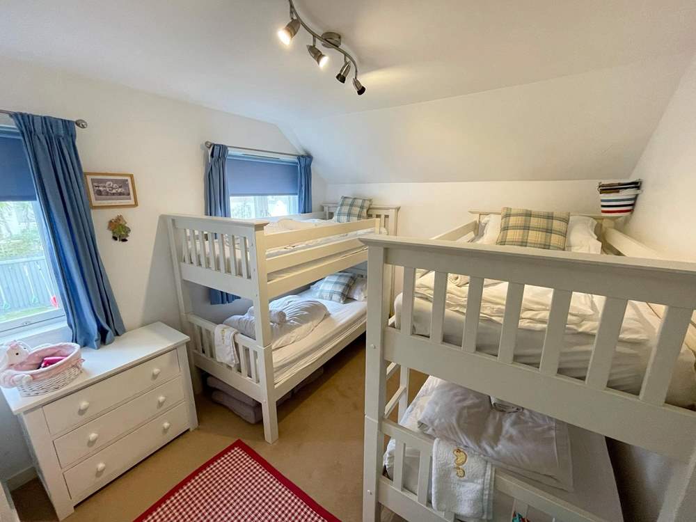 The children will love the double bunk-bed room.