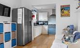 The kitchen is next to the children's playroom. - Thumbnail Image