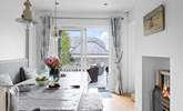 The dining-area has sliding doors onto the patio. - Thumbnail Image