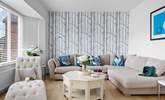 The gorgeous sitting-room has oodles of space for everyone.  - Thumbnail Image