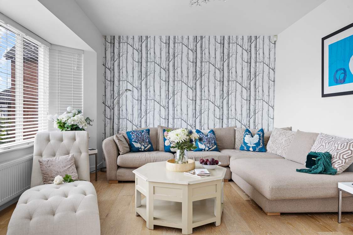 The gorgeous sitting-room has oodles of space for everyone.