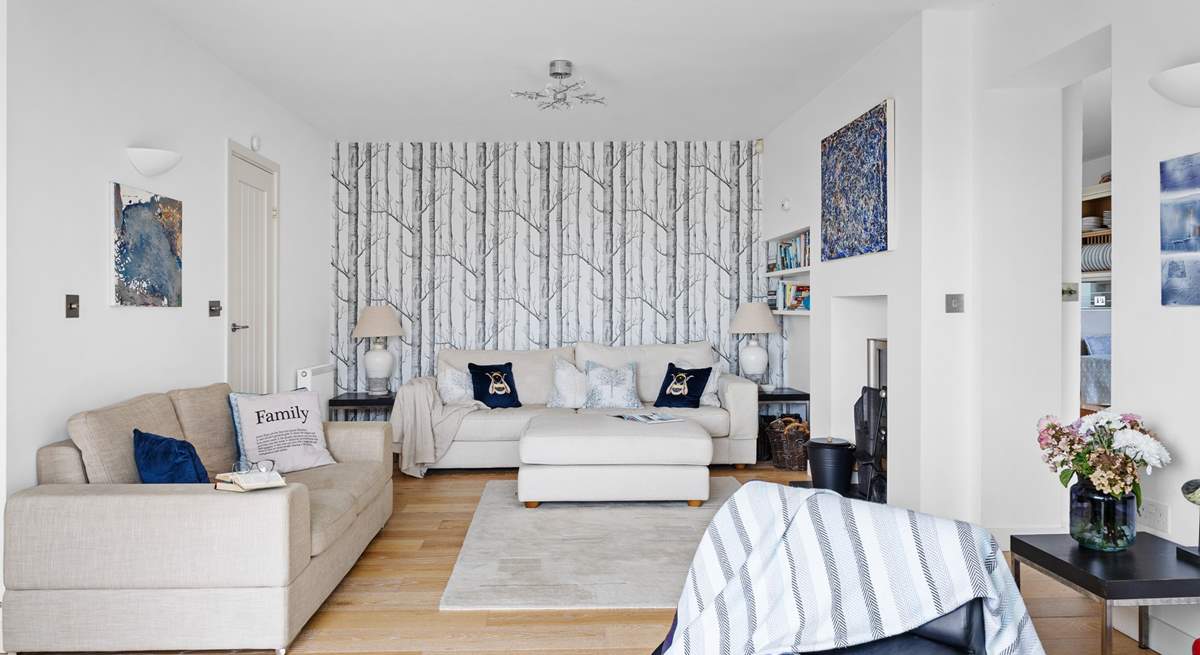 Relax on the sofas and watch a movie on the Smart TV.