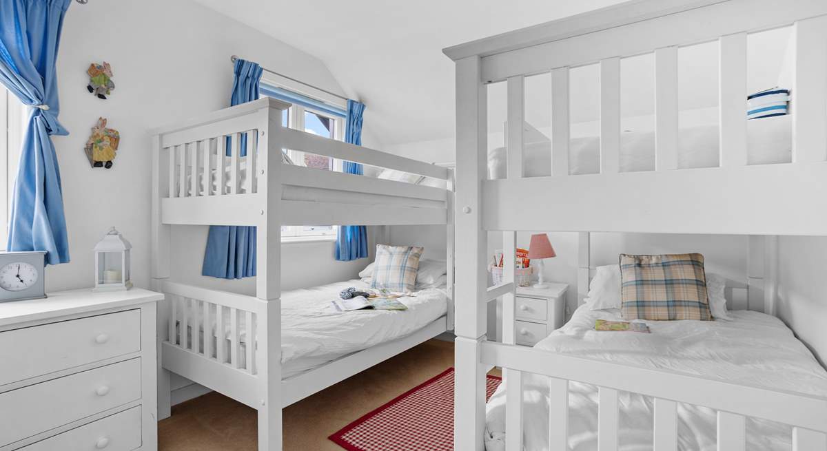 The children will love the double bunk-bed room. 