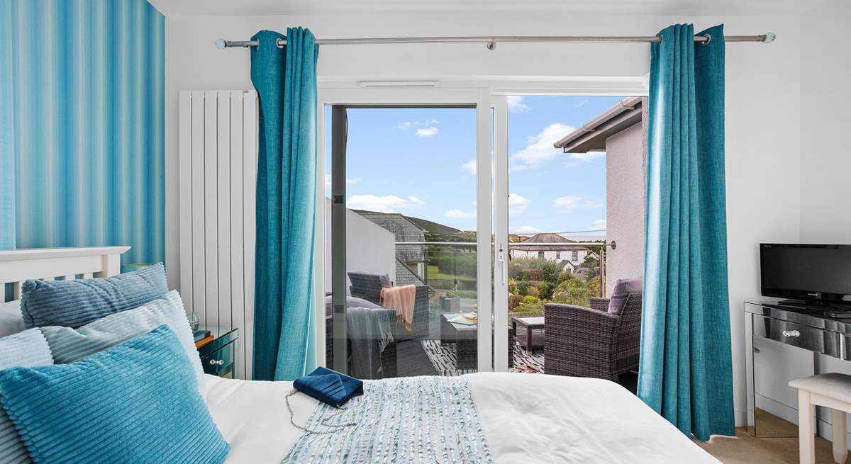 Open the patio doors and take your morning coffee outside. What a fabulous room to enjoy the views from.